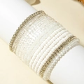 Close-up of bohemian multilayer beaded bracelet set with silver and translucent beads - Minimalist White/Silver/Clear Stackable Set (31261-bra-white-EP)