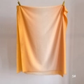 Detail of orange gradient scarf showing cashmere-like texture and soft fringe edges - 80*200cm / Yellow Beige Gradient