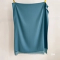Detailed view of sky blue cashmere-feel shawl with elegant tassel edges and soft texture - Peacock Green (SM-29)