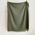 Detail of dark green cashmere-feel scarf showing soft fabric texture and fine fringe trim - Army Green (SM-12)