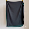 Close-up of high-quality cashmere scarf with fine tassels in black and dark green - Black Green (SM-36)