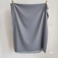 Detail of gray cashmere-like scarf showing soft texture and fine fringe tassels - Dark Grey (SM-35)