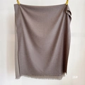 Detail of brown double-sided cashmere-like scarf with neat fringe edges on white background - Graphite (SM-16)