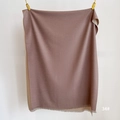 Detail view of double-sided cashmere-like scarf with tassels in mauve and camel tones - Caramel (SM-34)