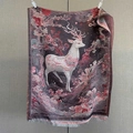 Close-up of vintage deer jacquard scarf featuring intricate floral patterns and grey tassels - 185x70 / Red Black