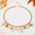 Bohemian gold chain necklace with white pearls, seashell charms, and golden starfish - Multi-Pendant Gold Chain Style (27246-1-gold)