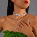 Detail of white lace ribbon choker with fabric roses and green leaf accents on neck - White Satin Rose (27576-white)