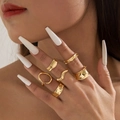 Macro shot of 6-piece minimalist gold rings set featuring wavy and hammered textures - Gold Minimalist 6-Piece Set (28475-G)