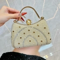 Elegant gold evening clutch with radiating pearl embellishments and a large pearl clasp - Off White
