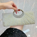 Sparkling evening clutch with white pearls and rhinestones featuring a round ring handle - Silver
