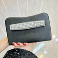 Elegant black satin clutch bag featuring three rows of white pearls and rhinestones - Black