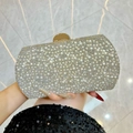 Elegant clutch bag featuring sparkling rhinestones and white pearls with golden clasp - Gold