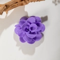 Detail of purple fabric camellia hair clip showing layered petals on gray background - Dark Purple (27677-5)