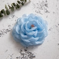 Detail of blue fabric camellia hair clip with delicate petals and colorful stamens - Blue (27678-2)