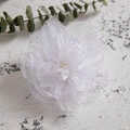 Detailed macro view of white fabric camellia hair clip with delicate pearl stamen details - Chiffon White (27678-6)