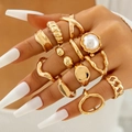 Golden irregular ring set with white pearl and geometric metal bands for women - Gold Fashion Ring 10-Piece Set (29036-G)
