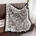 Detail of a large black and white floral silk scarf with bird motifs on a leather sofa - 90*90cm / Natural With Black Edge