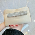 Elegant champagne satin clutch bag with three rows of pearls and rhinestones - Apricot