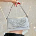 Elegant silver satin evening clutch bag with leaf-shaped rhinestone decoration and strap - Silver