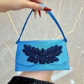 Elegant bright blue satin evening clutch bag with sparkling rhinestone wing design - Blue