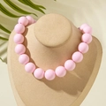Bohemian style necklace with large round pink beads displayed on a jewelry stand - Bohemian Beaded Style (27326-A) / 18mm Bead Diameter / Pink