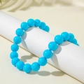 Bohemian style beaded necklace featuring vibrant turquoise round beads on a display stand - Bohemian Beaded Style (27326-A) / 18mm Bead Diameter / Sky Blue