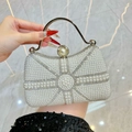 Elegant pearl evening handbag with silver frame and giant pearl clasp for party look - White