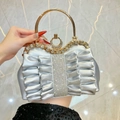 Elegant silver pleated evening clutch with crystal top handle and sparkling rhinestone center - Silver
