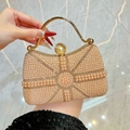 Elegant champagne pearl evening handbag with beaded geometric patterns and gold chain - Champagne