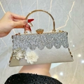 Champagne rhinestone evening handbag with floral accents and gold ring handle - Silver