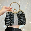 Elegant black pleated evening clutch bag with golden circular ring handle and rhinestones - Black