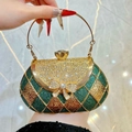 Emerald green evening clutch with golden lattice pattern and crystal bow handle - Green