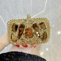 Bolso de noche dorado de lujo con diamantes de imitación ámbar y gemas de cristal - Dorado