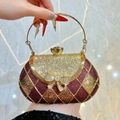 Deep burgundy evening clutch with gold diamond grid pattern and sparkling rhinestone bow - Burgundy