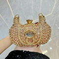 Pink rhinestone luxury evening clutch with oval gemstone and gold circular handle - Champagne
