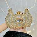 Elegant gold evening clutch with champagne rhinestones and crown jewel clasp - Silver