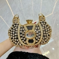 Golden luxury party clutch bag with crystals and large gemstone in a U-shaped design - Black