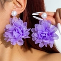 Detail of oversized purple mesh rose earrings with white pearl studs on model - Purple Pearl Style