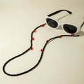 Cadena para gafas con cuentas negras y adornos de cereza roja y verde con lazos antideslizantes - Estilo Cereza de Cuentas Negras (30893-gla-cha-bla-EP)