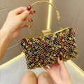 Detail of colorful rhinestone evening bag with gold ring handle and crystal inlay - Rainbow