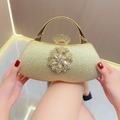 Elegante pochette da sera dorata glitterata con fiore di strass e manico in metallo - Oro