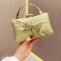 Elegant gold pleated evening clutch with sparkling rhinestone bow and metallic handle - Gold