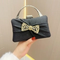 Elegant black pleated evening clutch with sparkling sequins and rhinestone bow detail - Black