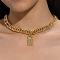 Close-up of a chunky gold Cuban chain necklace with a polished padlock pendant for women - Minimalist Padlock with Extension Chain Style (31171-nek-G-EP)