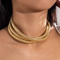 Close-up of triple-layered chunky gold snake bone chain choker with polished texture - Gold Triple-layer Snake Bone Style (28931-G)