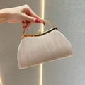 Elegant champagne evening clutch bag with pleated fabric and rhinestone ball clasp - Champagne