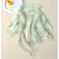Detail of silk sun mask with green bamboo leaf print and adjustable ear loops - Light Green - Dark Green Bamboo Leaf