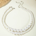 Close-up of double-layer pearl necklace with lobster clasp and adjustable silver chain - White Double-layer Gradient Pearl Necklace (28116-white)