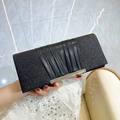 Elegant black glitter evening clutch bag with ruched design and silver metal clasp - Black