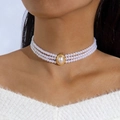 Detail of a vintage 3-layer pearl choker necklace with a gold oval centerpiece and large pearl - White 3-Row Woven Pearl Choker with Gold Clasp (28256-white)